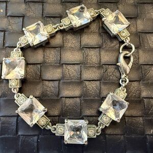 Art Decco Style Silver Tone Bracelet with Clear Stones and Detailed Links—7.25”